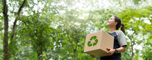 Woman Holding A Garbage Box Recycling Concept Recycle, Recycle, Plastic-free, Junk Food Plastic Packaging. On A Forest Nature Green Background Copy Space Plastic Recycling Environmental Pollution