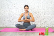 © Art_Photo - Portrait of sport slim strength woman training in sportswear sit relax, practicing yoga, fitness, exercise, wellness, workout, sport with blue fitball at home.Diet concept.Fitness, healthy lifestyle