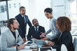 © Thurstan Hinrichsen/peopleimages.com - Business meeting, planning and people with laptop in discussion for ideas, strategy and collaboration. Corporate office, teamwork and men and women working on report, group project and proposal
