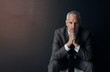 © Thurstan Hinrichsen/peopleimages.com - Mockup, chair and portrait of serious businessman, lawyer or attorney with confidence on dark background and studio space. Boss, ceo and professional business owner, proud senior director at law firm