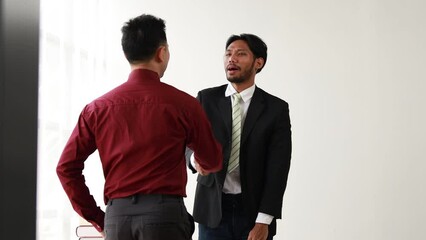 Poster - Two men greet each other by shaking hands, a client approaches a lawyer who is currently in court trying to win his case. The concept of getting legal advice and litigation.