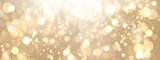 Fototapeta  - Festive abstract Christmas bokeh light background - golden bokeh lights shine , beige - New Year, Anniversary, Wedding, banner, header, panorama