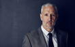 © Thurstan Hinrichsen/peopleimages.com - Mockup portrait of senior businessman, lawyer or attorney with serious face on dark background. Boss, ceo and professional business owner, mature director with executive management job at law firm.