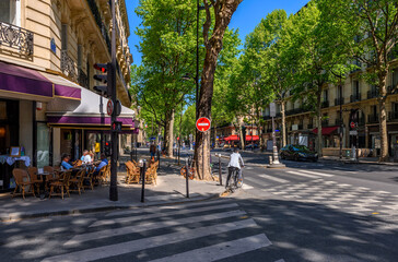 Wall Mural - cozy street with tables of cafe in paris, france. cityscape of paris. architecture and landmarks of 