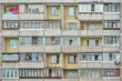 A frontal photo of a facade of a Russian residential block in Moscow (Brezhnevka)