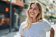 © Krakenimages.com - Young blonde woman smiling confident looking to the side at street