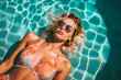 © ADDICTIVE STOCK - Generative AI colorful illustration of high angle of female in sunglasses and swimwear sunbathing and floating on water in swimming pool on summer vacation