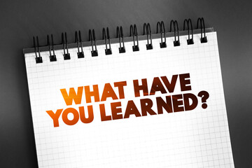 Wall Mural - what have you learned question text quote on notepad, concept background