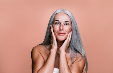 beautiful senior woman posing on a beauty photo session.