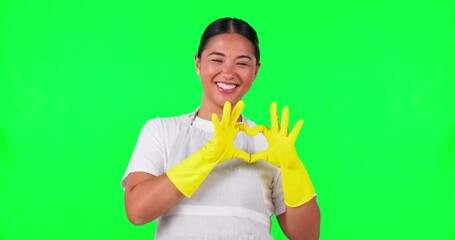 Sticker - Happy asian woman, heart hands and green screen in housekeeping against a studio background. Portrait of female person, maid or cleaner smile or show loving hand emoji, sign or symbol on mockup space