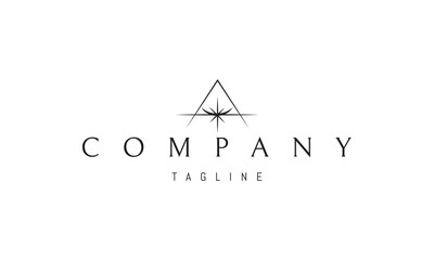 Wall Mural - vector logo on which an abstract image of a shining star against the background of a pyramid silhoue