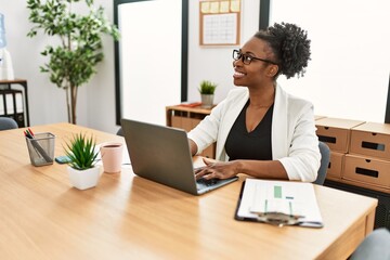 Canvas Print - African american woman business worker using laptop working at office