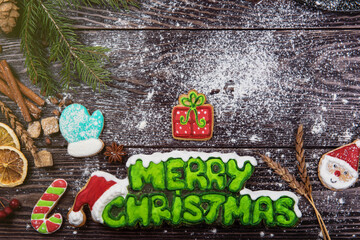 Canvas Print - Different ginger cookies for new years and christmas on wooden background, top view