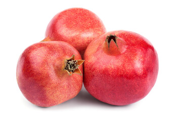 Wall Mural - Three whole ripe pomegranate fruits isolated on a white background.