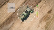 Smart Precision Farming. Aerial Of Harvester Digitally Controlled With Artificial Intelligence For More Efficient Field Production. Eco Sustainable Robotic Agriculture Revolution.