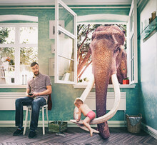 Elephant Takes The Child Through A Window, While His Father Looks Distracted.  Photo Combination Concept