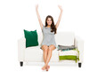 © Designpics - Beautiful woman relaxing on a sofa, isolated over a white background