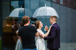 Professional wedding videographer shoots a movie with the newlyweds