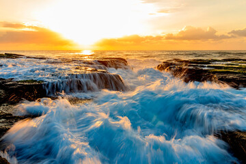 Wall Mural - Crashing waves at Narrabeen at sunrise, NSW, Australia