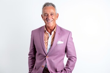 Wall Mural - Portrait of happy senior businessman smiling at camera while standing against white background