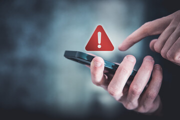 System hacked warning alert, Man using smartphone with cyber attack network, virus, spyware, scam or Malicious software. Cyber security and cybercrime. Compromised information internet