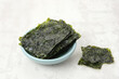 Korean Seaweed, salted nori laver sheet on a plate 

