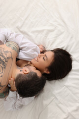 Wall Mural - passionate couple having sex on bed, top view