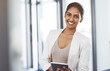 © Thurstan Hinrichsen/peopleimages.com - Tablet, accountant and portrait of happy woman in office for business, research app and internet email online. Face, technology and corporate auditor from India with pride for career, job and smile.
