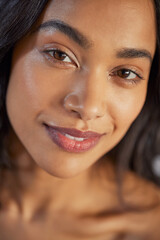 Wall Mural - close up portrait of beautiful multiethnic girl looking at camera