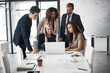 © Thurstan Hinrichsen/peopleimages.com - Business people, meeting with paperwork and laptop training with ideas in job collaboration on project proposal. Teamwork, strategy and coaching workshop, men and women in target management at office