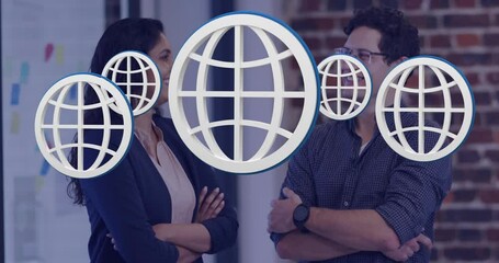 Sticker - Animation of multiple web globe icons floating against diverse man and woman smiling at office