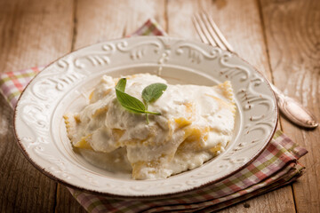 Canvas Print - italian ravioli with cheese fresh cream and sage