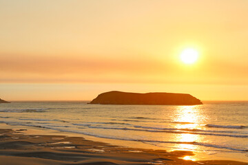 Wall Mural - Beautiful sunset on the shores of the Pacific Ocean. Rest, relaxation.