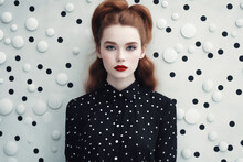 Woman With Red Hair Wearing Black Shirt With White Polka Dots On It. Generative AI.