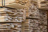 Fototapeta Łazienka - Close up of stacks of lumber being stored in a warehouse