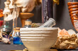 Mortar and pestle witchcraft alchemy still life selective focus, witch craft pharmacy and medicine. Spiritual occultism chemistry, magic alchemy and ritual arrangement.
