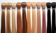 © Margo_Alexa - assortment of hair for hair extension procedure. types of materials, color and quality for the presentation of the service. Toning of different shades of the background of the strands. Social media