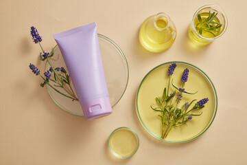 Wall Mural - A purple tube placed on podium, displayed with laboratory glassware filled with yellow fluid and purple lavender flowers. Lavender (Lavandula) essential oil can protect your nervous system