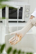 © wei - A woman wears rubber gloves to clean things in the kitchen,,Performance testing of rubber gloves, brochure image, indoor shot, close-up