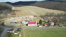 Ariel View Of A Rustic Red Roof Barn In Muffling County, Pennsylvania - Breathtaking Country Setting