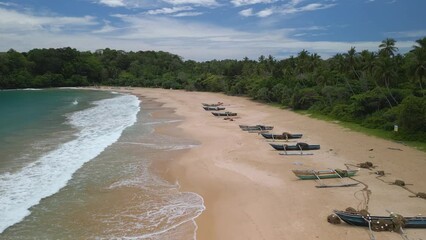 Sticker - Aerial video of boats and tropical trees on the sea shore, Tallala Beach, Sri Lanka