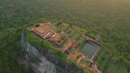 Canvas Print - Aerial of the Lion Rock or Sigiriya mountain in Sri Lanka surrounded by the dense green forest