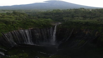 Sticker - Landscape scene of Semeru Mountain and Tumpak Sewu waterfall in East Java, Indonesia with cloudy sky