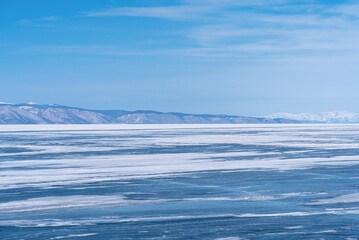 Wall Mural - Winter landscape with mountains and Lake Baikal in Siberia on sunny day. Natural background with copy space.