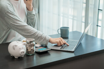 Close up young woman saving money for household payments coin,  piggy bank, mutual fund, mixed fund, Super Saving Funds (SSF), Retirement Mutual Fund (RMF), Net Asset Value (NAV), dividend, Inflation
