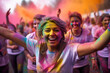 Happy people in white tshirts participating in the colour run.