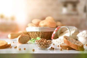 Wall Mural - Freshly prepared soy alternative bread on bench in rustic kitchen