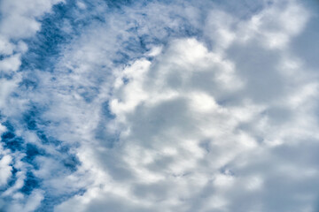 Wall Mural - White cloudy forming on blue sky in sunny day