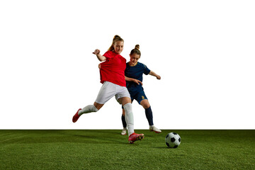 Sticker - Two young girls, football players in motion, training, dribbling ball against white background. Sportschool. Concept of professional sport, action, lifestyle, competition and hobby, training, ad