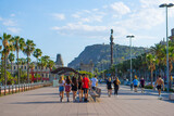 Fototapeta Miasto - People walking in Barcelona during summer